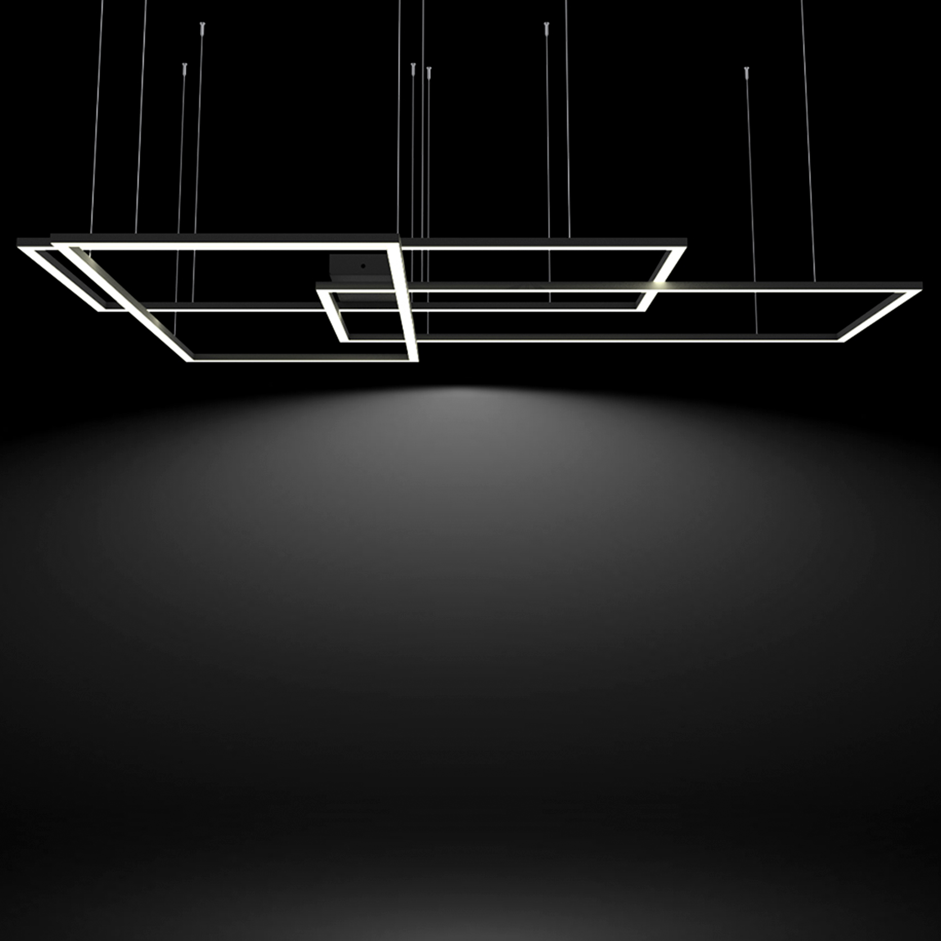 Luminarios suspendidos con tres rectángulos de iluminación en color negro rugoso con iluminación blanco neutro