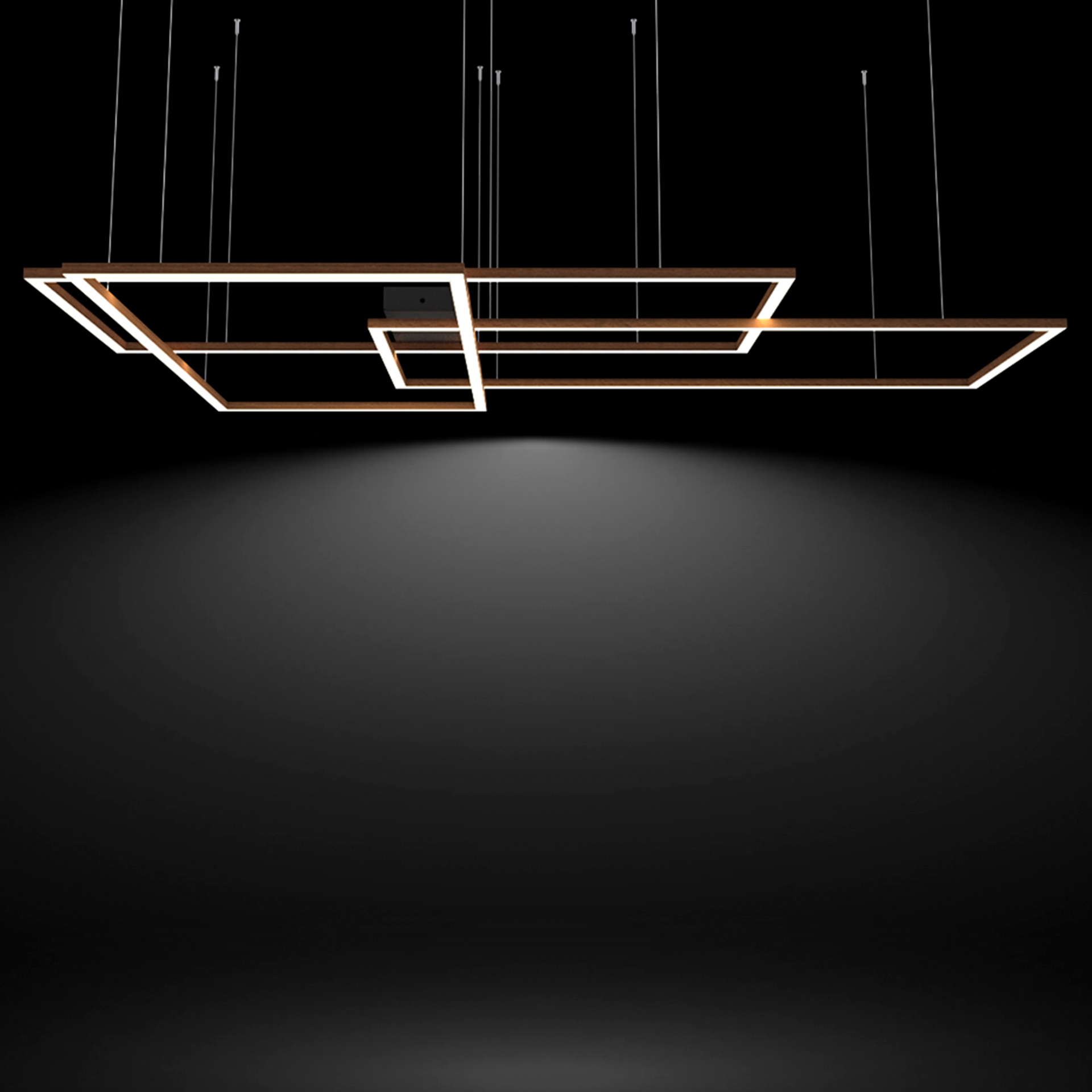 Luminarios suspendidos con tres rectángulos de iluminación en color champagne con iluminación blanco neutro