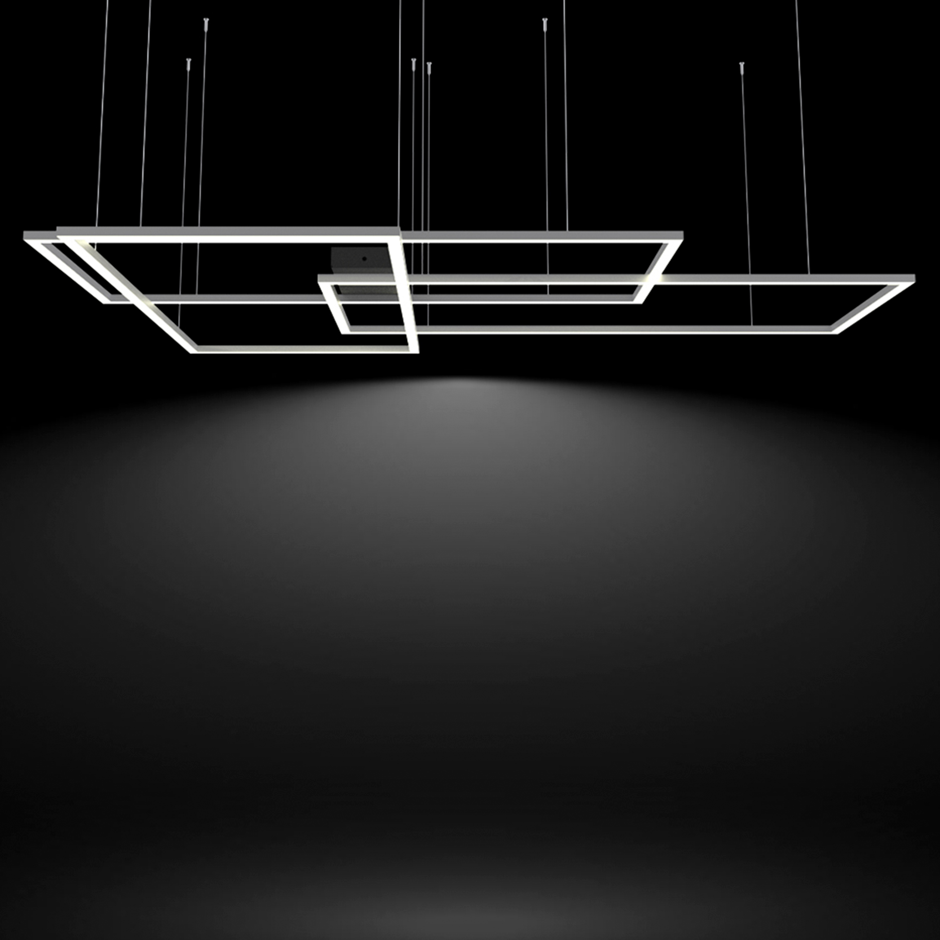 Luminarios suspendidos con tres rectángulos de iluminación en color gris con iluminación blanco neutro