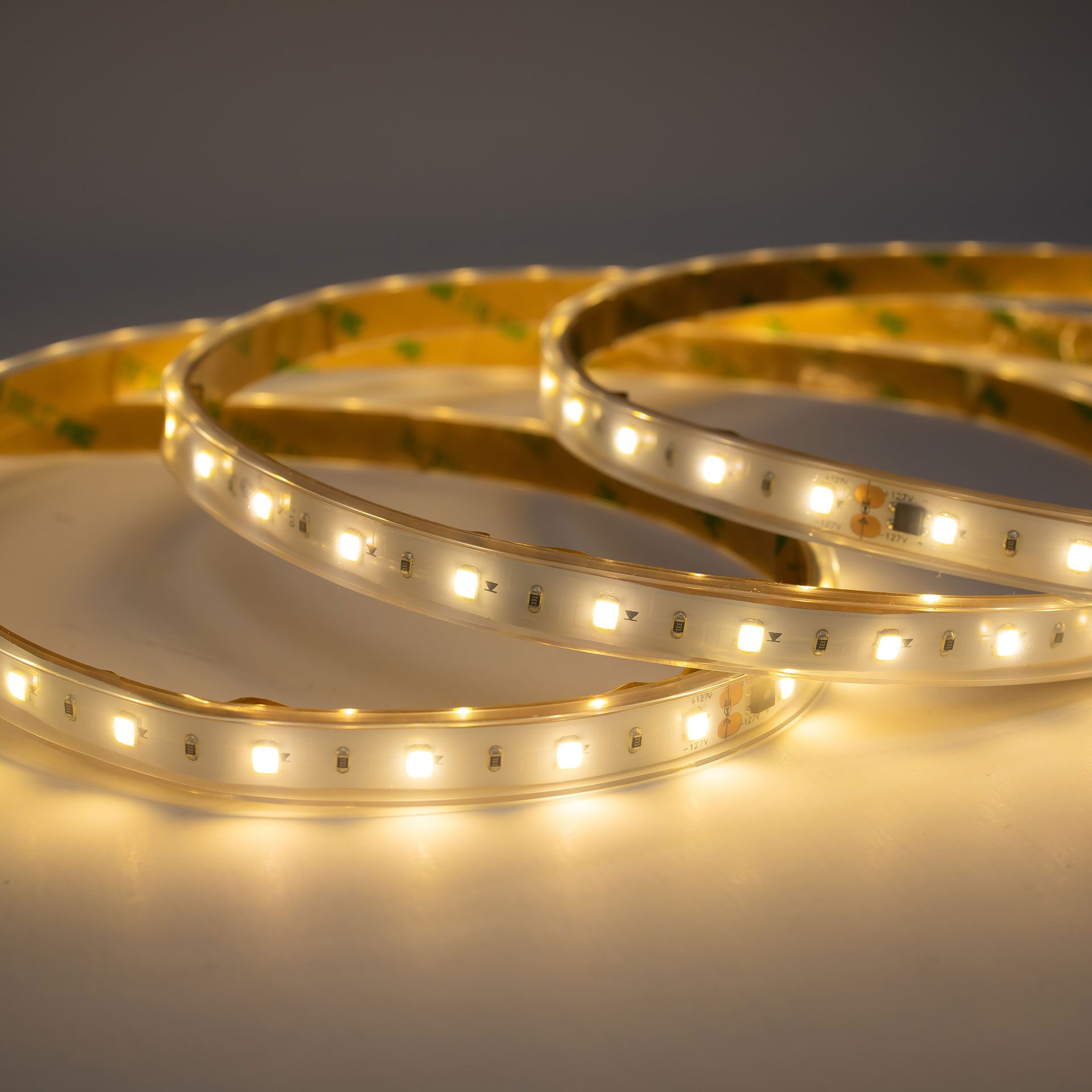 TIRA FLEXIBLE 60 LEDS POR METRO, 2835 SMD 127 V, EXTERIOR / BLANCO CALIDO